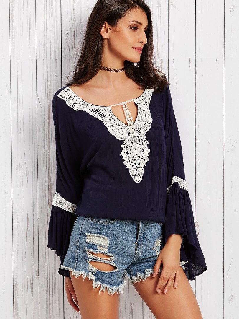 Blusa con ricami uninetto