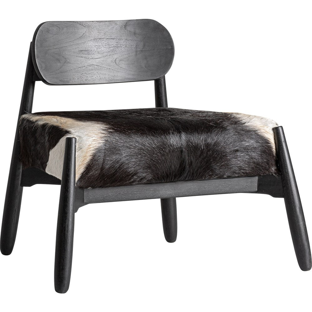 Poltrona Safari Chic in teak nero e pelle bovina naturale con pelo.