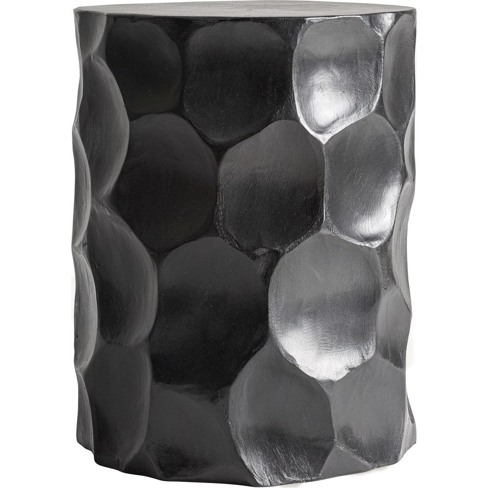 Sgabello scultoreo in legno di suar nero dal design Organic Luxury.