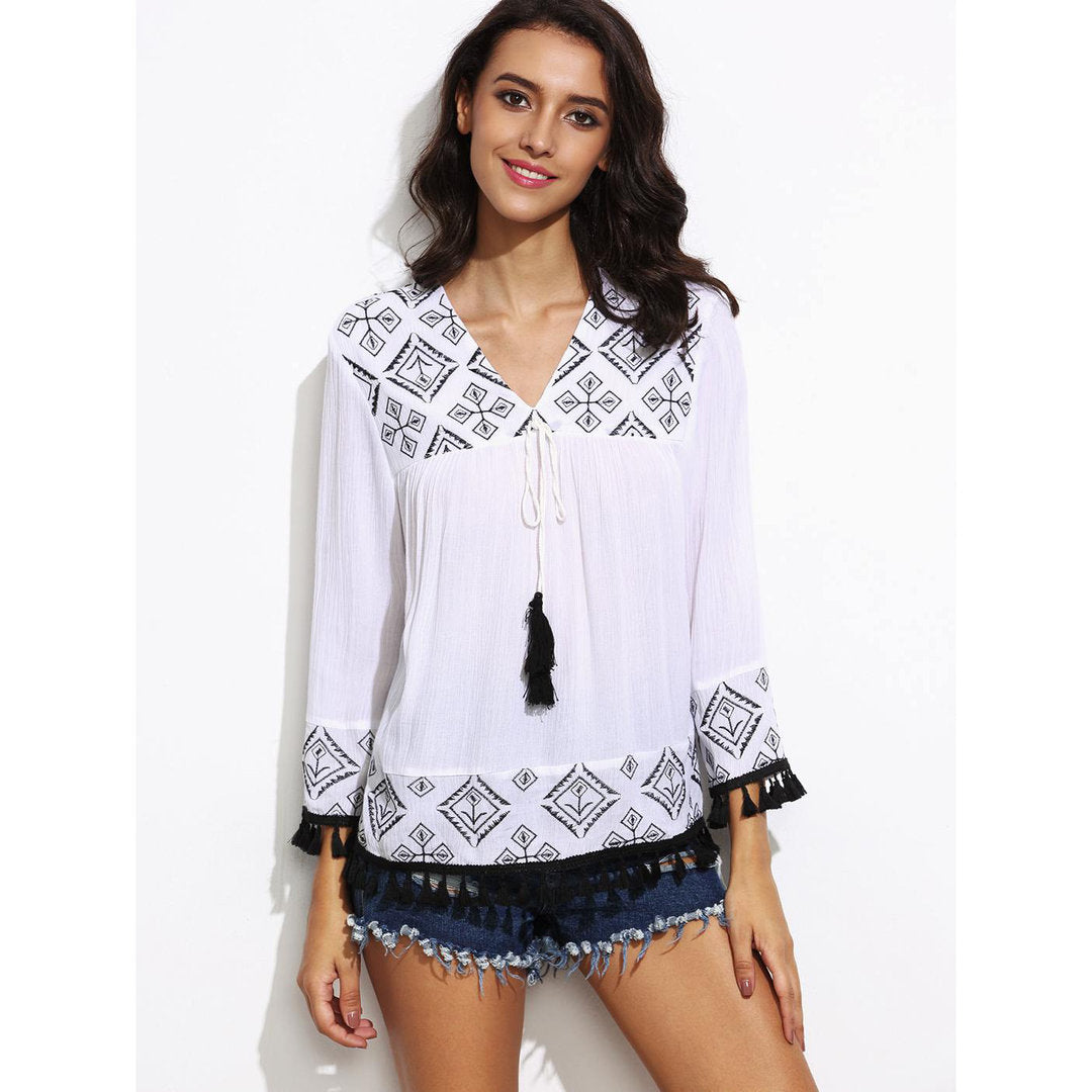 Tunica con decorazioni tribali